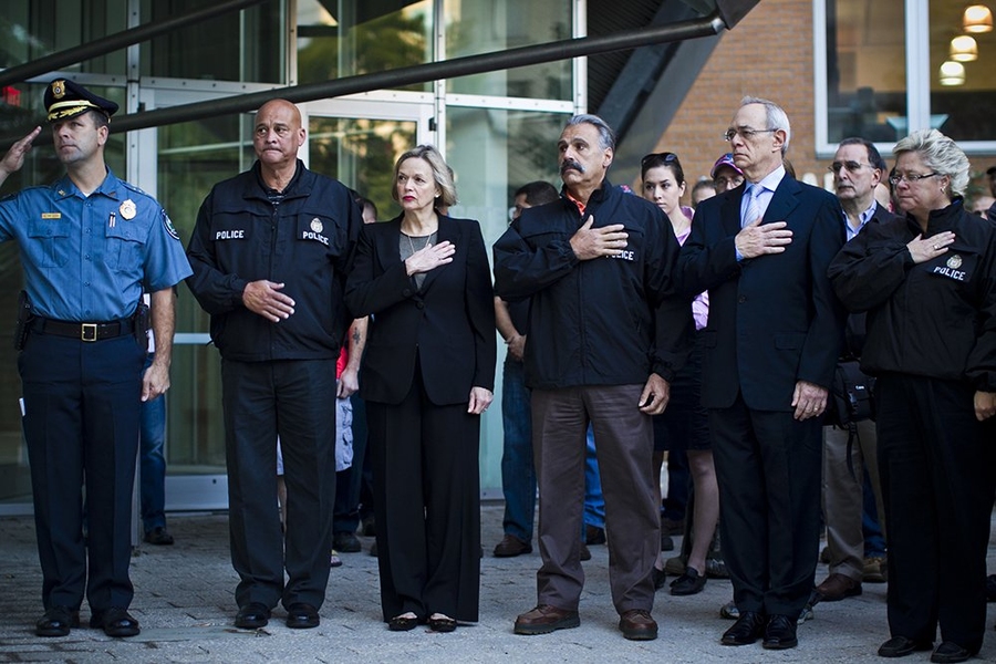 MIT President L. Rafael Reif (front row, second from right) was joined at the ceremony by John DiFava, MIT's director of facilities operations and security (third from right), and by his wife, Christine Reif (fourth from right).