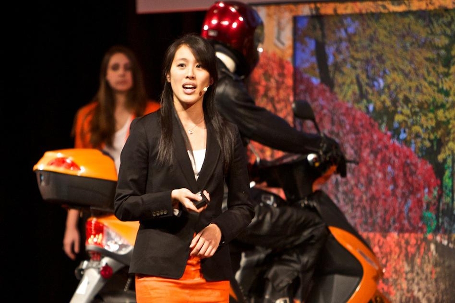 Student Candace Chen describes Mira, a helmet-mounted display that gives motorcycle riders directions without requiring them to glance away from the road ahead.