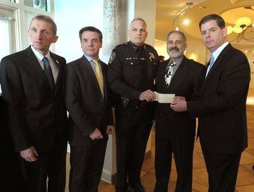 (From left to right) Commissioner William B. Evans, Israel Ruiz, Detective Lt. Christopher Hamilton, John DiFava, and Mayor Marty Walsh.