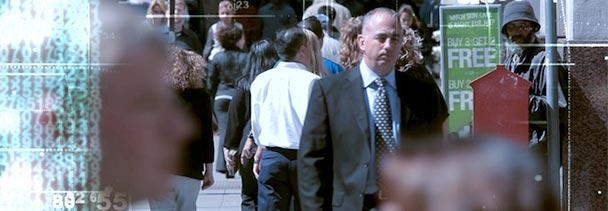 Crowded crosswalk with overlay of digital numbers