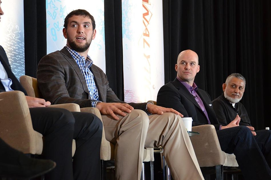 Indianpolis Colts quarterback Andrew Luck (left) during a panel discussion on "Athlete Analytics" at the 2014 MIT Sloan Sports Analytics Conference, held Feb. 28-March 1 in Boston.