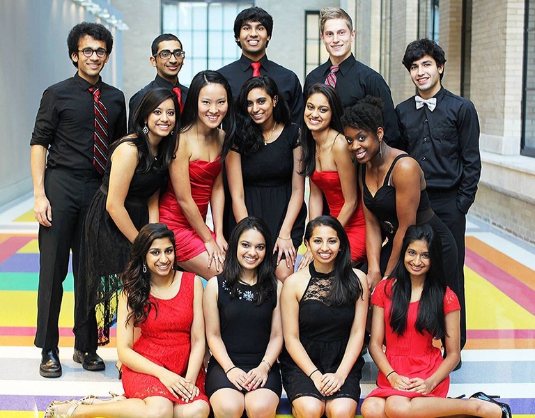 Priyanka (left, second row) poses with her dance team MIT Mirchi for a group picture during a fall photo session. Co-founded by Priyanka and two friends in 2011, Mirchi is in its third year of performing at events on campus as well as at neighboring universities.