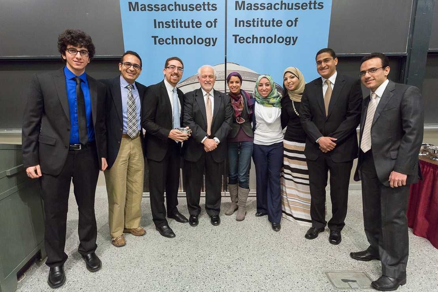 Chris Colombo, dean for student life (center), presenting the William L. Stewart Jr. Award to members of the Egyptian Student Association. 