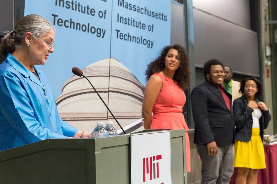 Seniors Camille A. DeJarnett, Elise M. Myers, and Joshua V. Sibblies are presented with the Ronald E. McNair Scholarship Award by Judy Cole, executive vice president and CEO of the MIT Alumni Association.