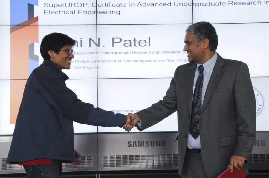 Rishi Patel, EECS senior, received his certificate from Anantha Chandrakasan. Patel will pursue a PhD in applied physics at Stanford University in the fall, studying in the field of experimental quantum optics and optomechanics — the area in which he worked as SuperUROP.