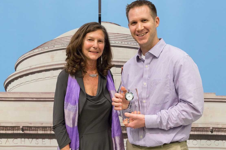 Elizabeth Reed, MIT's senior associate dean for undergraduate education, presents the Everett Moore Baker Memorial Award for Excellence in Undergraduate Teaching to William A. Tisdale, the Charles and Hilda Roddey Career Development Assistant Professor in Chemical Engineering.