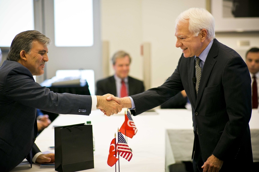 Turkish president Abdullah Gul (left) greets MIT Vice President Claude Canizares (right) in MIT's Building 10 on May 30.