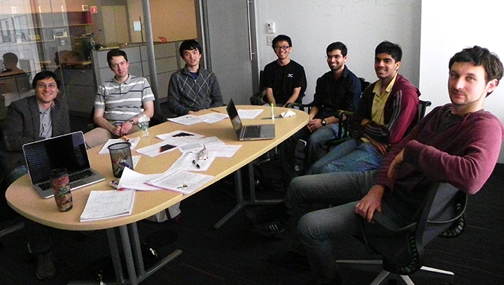 Collaborators (clockwise from left) Jeff Gore and Kirill Korolev meet with Lei Dai, Ching-Hao Wang, Vipul Vachharajani, Saurabh Gandhi, and Eugene Yurtsev to discuss research into range expansions. Wang is in Korolev's group at Boston University, while the others are in Gore's group at MIT.