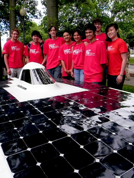 Members of MIT's Solar Electric Vehicle Team unveiled "Valkyrie," a solar car they will enter in the American Solar Challenge in July. From left to right are: Andrew Liotta, Michael Chang, Josh Sloane, Chad Uyehara, Priya Kikani, Jonas Gonzalez, David Fellows (behind Gonzalez) and Michelle Chao.