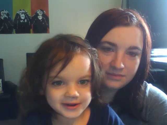 Computer view of a parent and child using the Lookit website.
