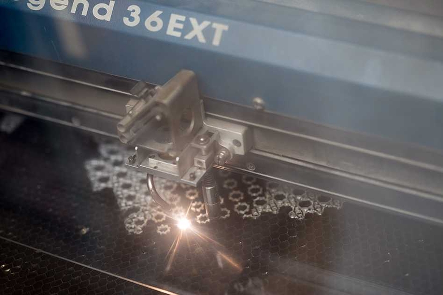 Dina El-Zanfaly designs and prints a necklace using CAD and a laser-cutter.