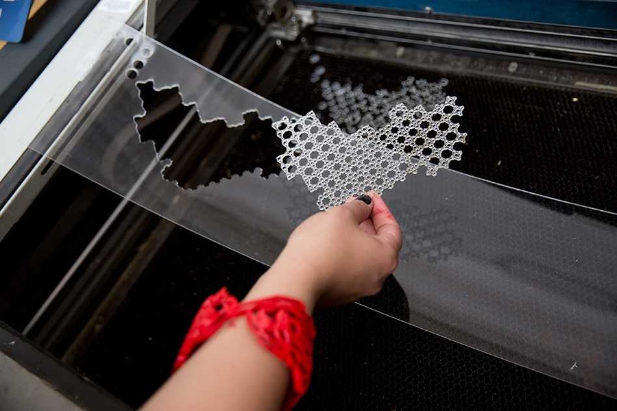 Dina El-Zanfaly designs and prints a necklace using CAD and a laser-cutter.