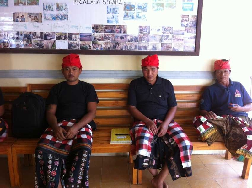 "Pecelan laut," or "sea police," in traditional Hindu garb, a source of great pride for local men. 