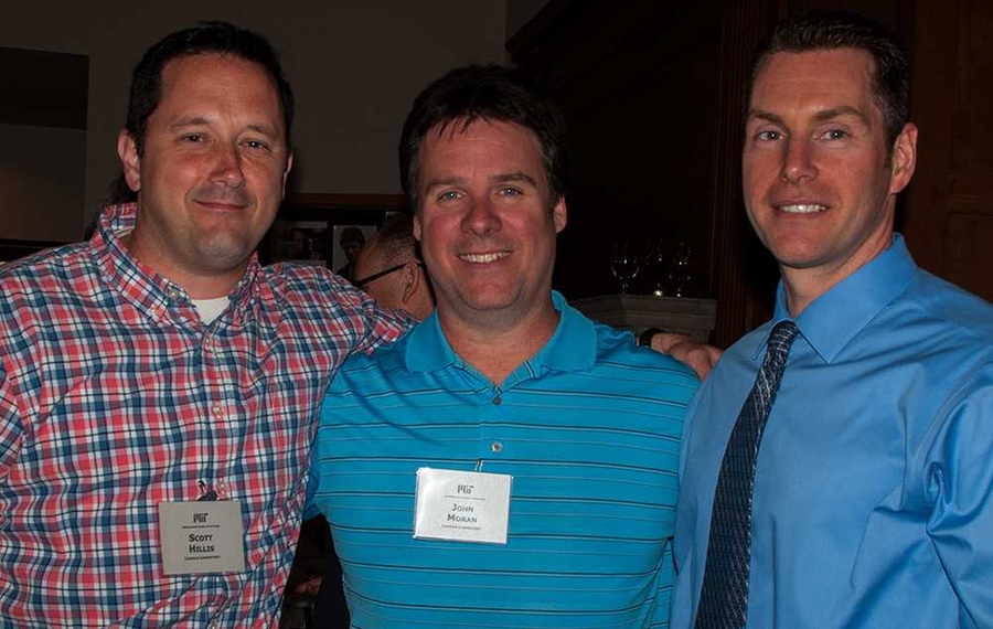 Scott Hillis, John Moran, and Roger Shields of Lincoln Laboratory celebrate their induction to the MIT Quarter Century Club.