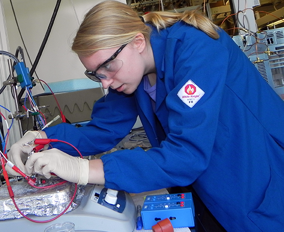 Catherine Groschner hooks up a three-electrode cell, which she used to test catalysts for converting carbon dioxide into carbon monoxide for synthesis gas, which could then be transformed into transportation fuels. Groschner studied how different ad-atoms affect the performance of a copper foil catalyst.