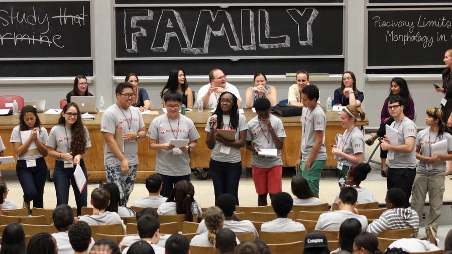 During the summer workshop, students present their peers' science and engineering projects in layman’s terms.