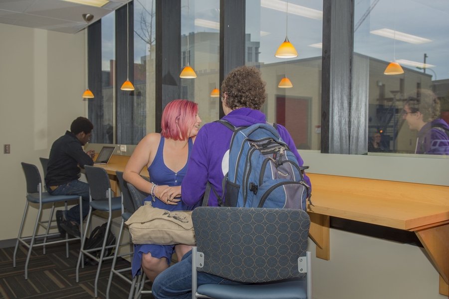 Overlooking Vassar Street, the naturally lit lounge provides a community space for students to visit and study.