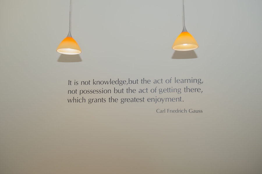 A quote from German mathematician Carl Friedrich Gauss and other pieces of art don the walls to enhance the space.