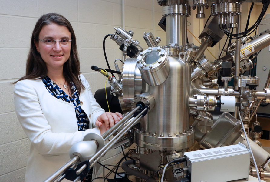 Bilge Yildiz with a scanning tunneling microscope customized to study oxide material surfaces at high temperatures under mechanical stress in the presence of oxygen, water vapor, or other reactive gases. 