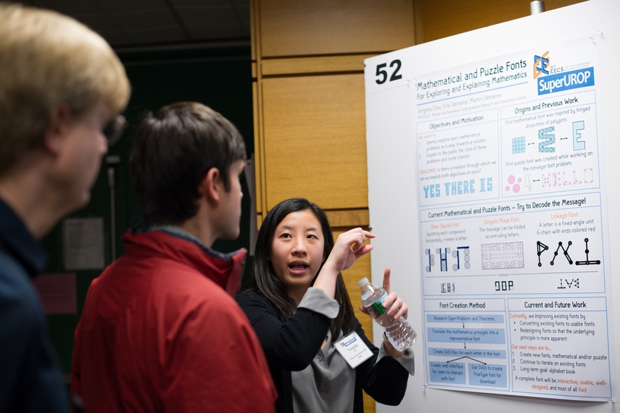 Virginia Chiu (center) presented her work to build methods of explaining mathematics through fonts, ultimately constructing an alphabet.