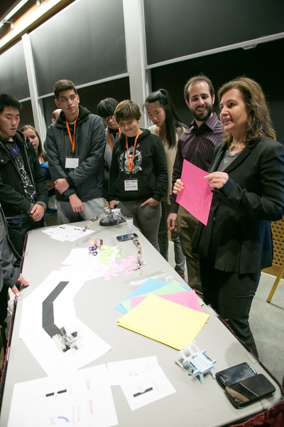 Daniela Rus (right) talks to students about her group's work in printable robotics.
