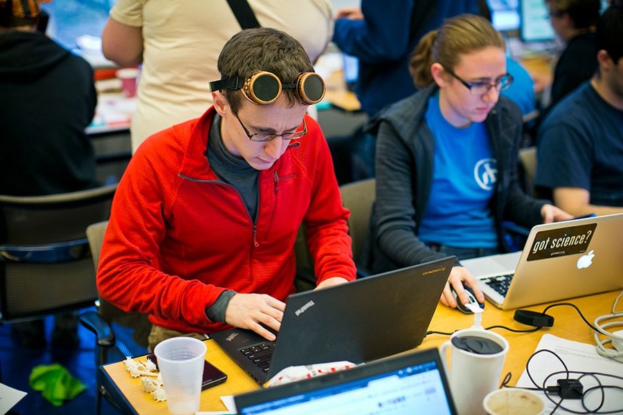 A member of the team running this year's hunt, at work in headquarters. His goggles are in keeping with this year's theme of "20,000 Puzzles Under the Sea."