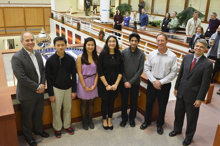At the event to unveil the pendulum exhibit, the four Lexington High School students who helped with the project — (l-r) Jerrick Chen, May Zhou, Mai Kobs, and Videh Seksaria — were photographed with Frank Robey, technical lead for the project (far left), David Scott, manager of the Technology Office Innovation Laboratory (second from right), and Eric Evans, director, Lincoln Laboratory (far ri...