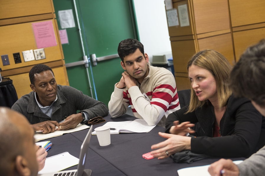 All Start6 students worked singly or as groups with one of 52 mentors to develop a project. Here, Delphine Zurkiya, partner at McKinsey & Co. in Boston, talks with one group.