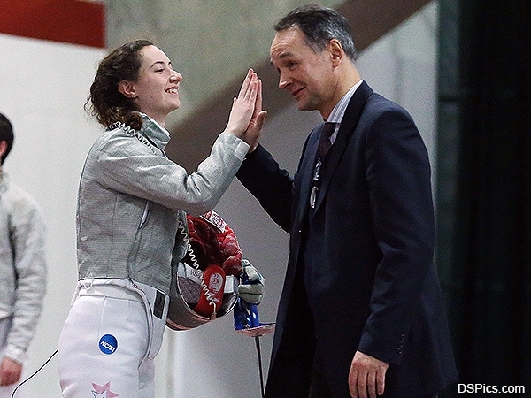 Sophomore Cordelia Avery and head coach Jarek Koniusz celebrate the team title at the New England Championship held on Saturday at Vassar College.