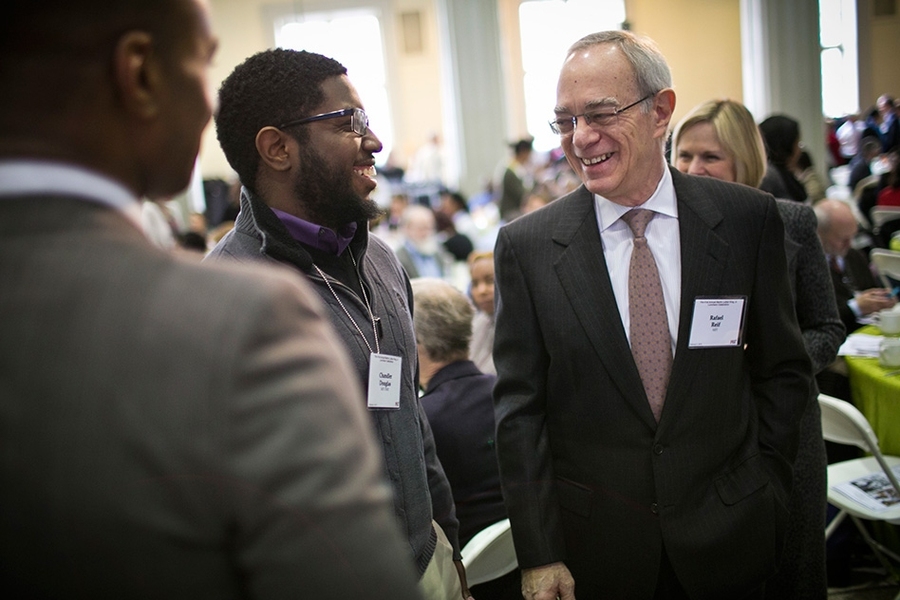 MIT president L. Rafael Reif chats with attendees at the annual luncheon.