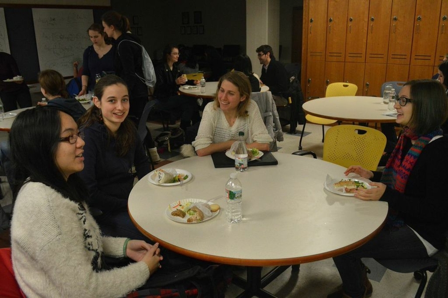 Freshmen and mentors mingle during the Mini-UROP kickoff event in December, 2014.