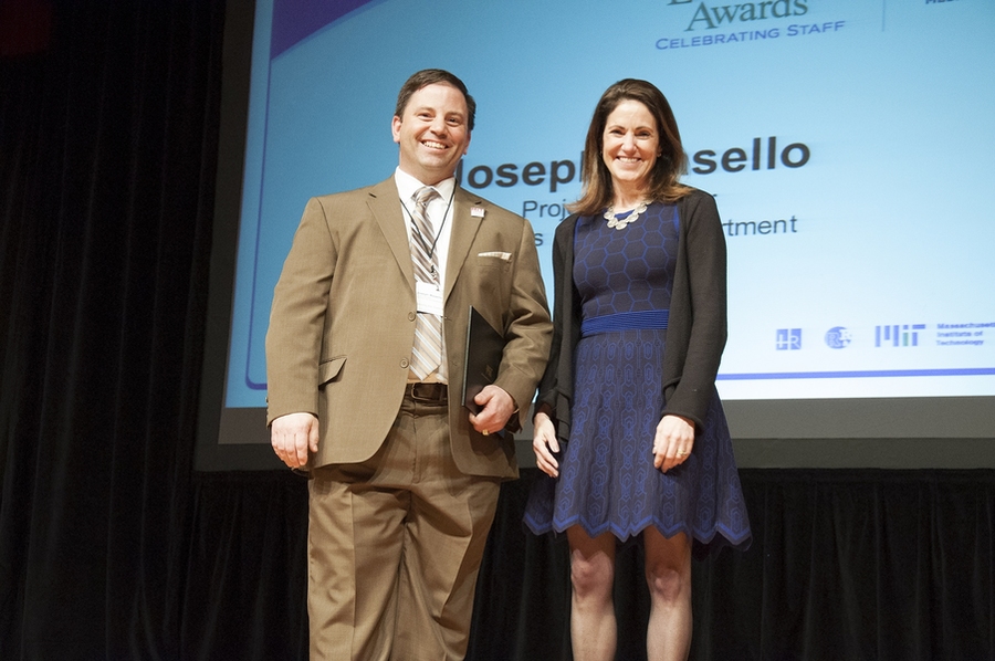 Chancellor Cynthia Barnhart presents Joseph Masello with a Serving the Client Award.