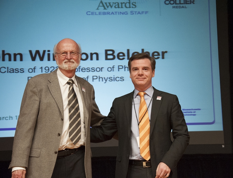 Israel Ruiz (right) presents Professor John Winston Belcher with an Advancing Inclusion and Global Perspectives Award.