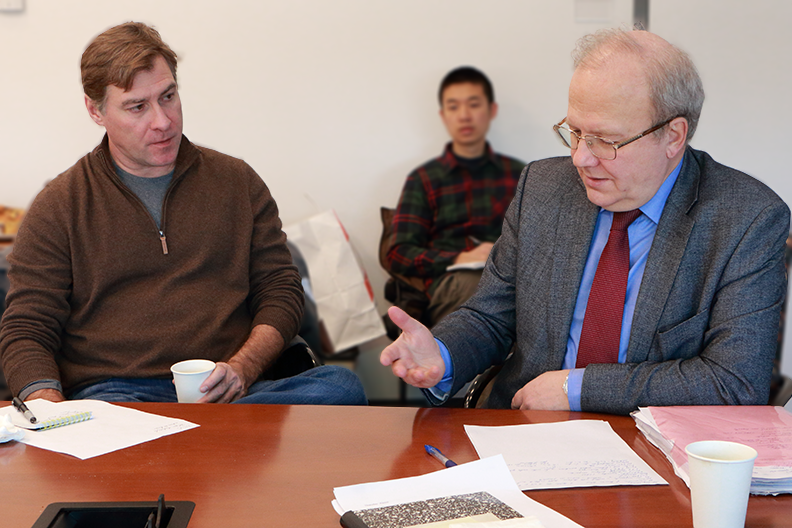 Skoltech Center for Electrochemical Energy Storage (CEES) Director Keith Stevenson (left), listens to CEES Moscow State University Co-Director, Alexei Khokhlov, who is professor and head of polymer physics as well as vice-rector at Moscow State.