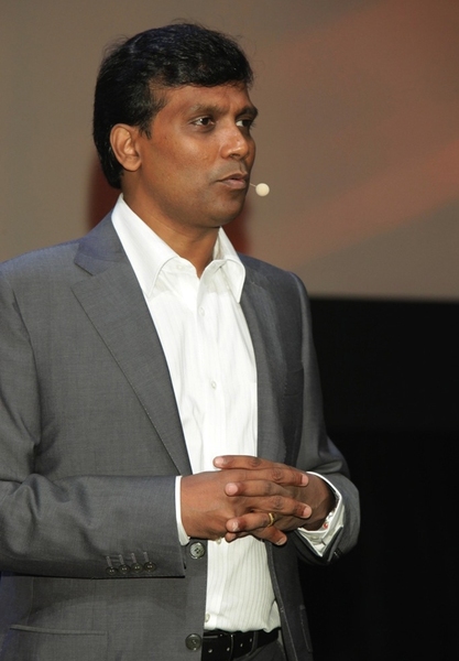 Ravi Kumar, executive vice president of Infosys, speaks at an industry technology conference.