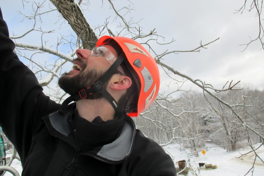 Film director Patrick Wellever climbs in the forest. As the Knight Science Journalism program's digital media training coordinator, Wellever ensured that Knight Fellows received instruction in videography, video editing, animation, still photography, audio editing and podcasting, Web design, mapping, and data journalism.