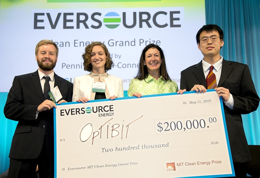 Optibit took home both grand prizes from the 2015 MIT Clean Energy Prize. Shown here are (from left) Optibit team members Mark Wade and Alex Wright; Penni McLean Conner of Eversource; and Optibit team member Chen Sun. 