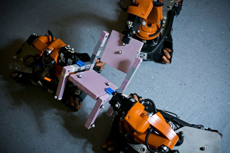 MIT researchers tested the viability of their algorithm by using it to guide a crew of three robots in the assembly of a chair.