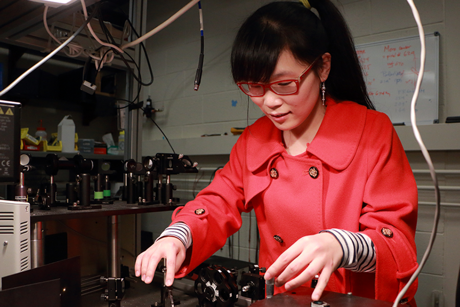 MIT physics graduate student Qiong Ma, who is part of Associate Professor Pablo Jarillo-Herrero’s group, is doing original research on the electrical properties of graphene-based devices in combination with hexagonal boron nitride, using laser light stimulation.