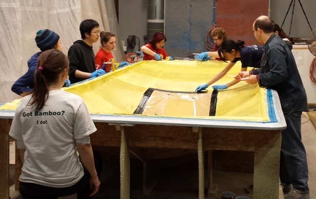 MIT Solar Electric Vehicle Team at work on layup at Custom Composites in Maine