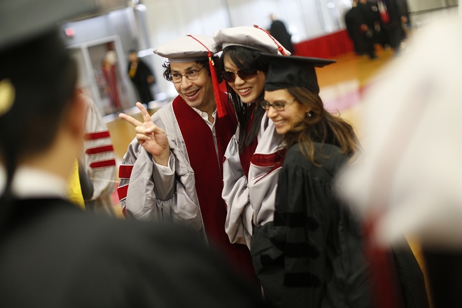 Advanced degree candidates snapped photos with friends and family before the MIT hooding ceremony, held June 4.