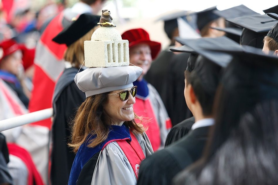Chancellor Cynthia Barnhart decorated her tam with a foam model of the MIT dome and a toy beaver.