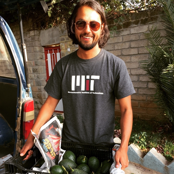Sid Kamath MBA '15, founder of GreenPath Food, unloads one of the first permaculture avocado harvests.
