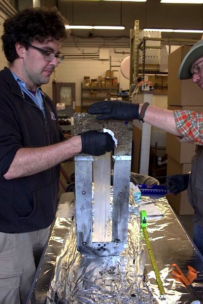 Dan Prendergast (left) and Department of Civil and Environmental Engineering research engineer John MacFarlane process a recovered passive sampler.