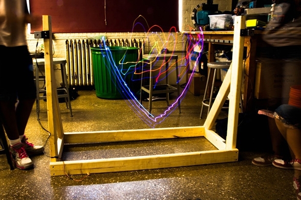 High school students on Team XGPS created this long-exposure photograph of the first prototype of a 3-D positioning system that can show LED lights in three-dimensional space.