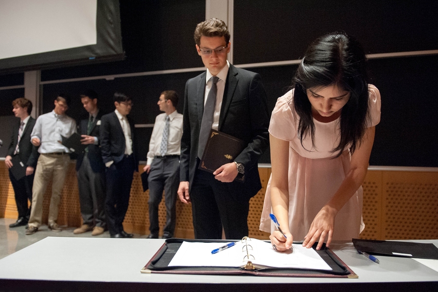 During the Phi Beta Kappa ceremony, 80 inductees were individually recognized and signed the register of the Xi of Massachusetts chapter.