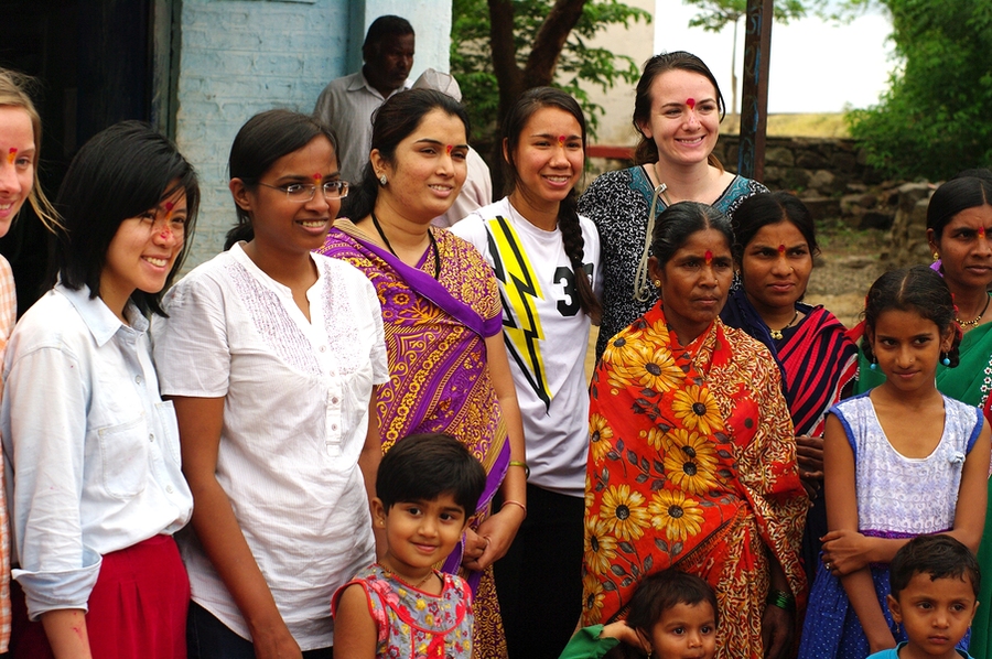 Tata Fellows pose with residents of a village in Satara District, Maharashtra, India.