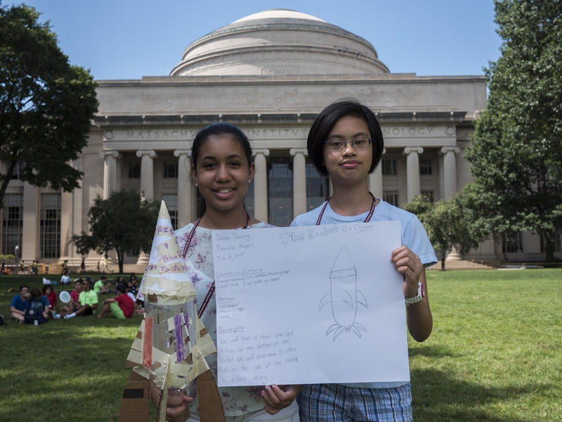 Daniela Reyes of Lawrence and Danica Truong of Boston pose in MIT’s Killian Court before launching a bottle rocket they built.