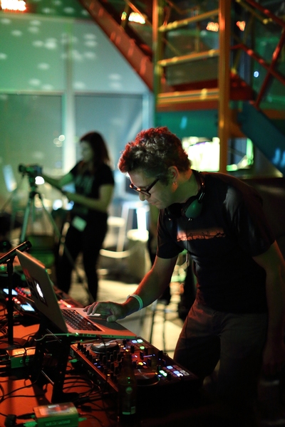 Madeleine Gallagher, media associate for the Program in Art, Culture and Technology (ACT), runs through a sound check with the Jesse Kaminsky of the Department of Urban Studies and Planning. Other DJs included Professor Ian Condry, graduate student Jessika Khazrik, and ACT alumna Floor van de Velde SM '14.