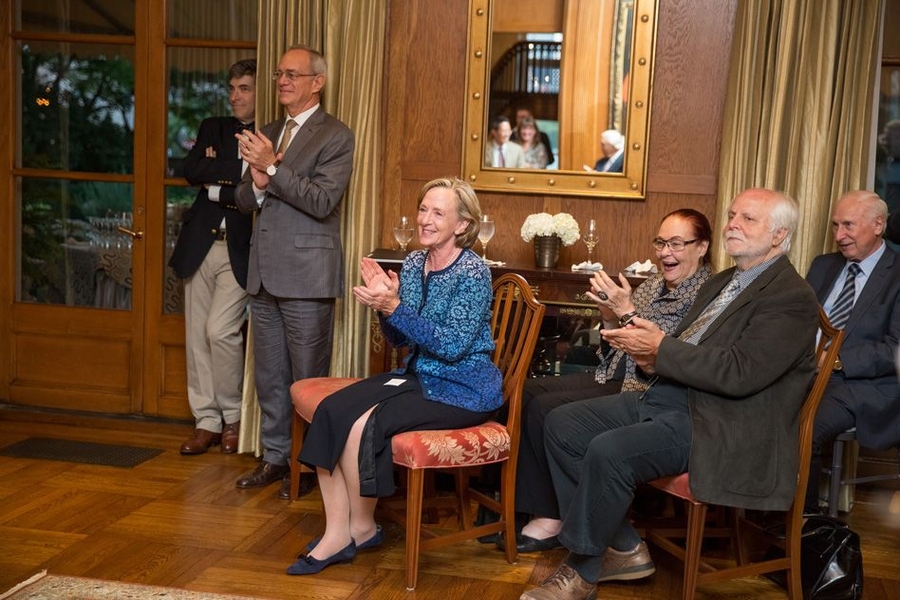 Hockfield with President L. Rafael Reif (standing, to her right) at the portrait's unveiling.